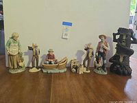 Group shot of all seven figurines