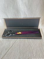 Closed case showing shears inside