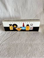 Closed Parfums Paris gift box front showing images of included bottles