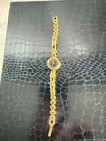 Full view of watch showing bracelet and dial