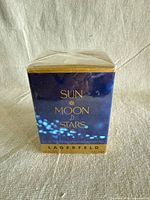 Front view of sealed Sun Moon & Stars eau de toilette box