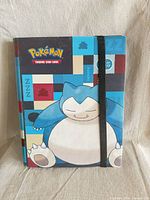 Front view of Snorlax Pokémon trading card binder