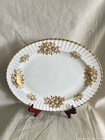 Full view of oval platter on stand