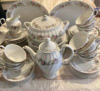 Full set arranged showing pattern and major serving pieces