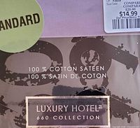 Front of packaged Luxury Hotel 660 Collection pillowcase showing material and satin label