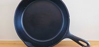 Front view of cast iron frying pan
