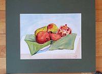 Front view of matted watercolor still life painting