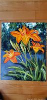 Full view of the painting showing three orange day lilies and foliage