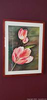 Full view of framed watercolor painting on wall