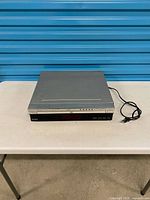 Top and front view of Koss KD270-2 player with attached power cord