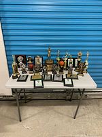 Full table view showing all trophies and plaques