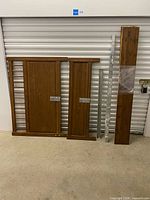 Front view of all wooden panels and metal rails