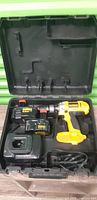 Entire set inside carry case: drill, two batteries, charger