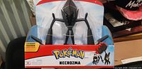 Front of sealed Pokémon Necrozma figure box