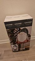 Retail box front showing image and specifications of adjustable gnome