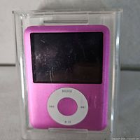 Front view of pink iPod Nano inside clear case