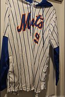 Front view showing Mets script and overall design