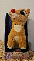 Front view of boxed 7" Rudolph plush animatronic