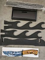 Knife and five rack parts laid out