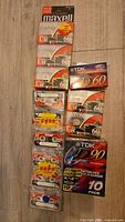 Overall lot showing 8 Maxell UR 60 singles, 1 TDK D60 single and 1 TDK D90 10-pack
