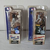 Front view of both sealed McFarlane SportsPicks MLB two-packs