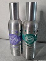 Both Scentsy room sprays standing side by side