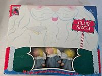 Box front showing Club Santa 10-light set with angel figures visible