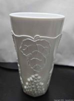 Full view of milk glass cooler cup showing raised leaf motif