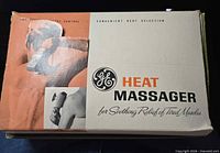 Front of GE Heat Massager box showing branding and product image