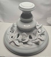 top angle showing candlestick profile and floral openwork base