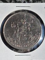Reverse side showing Jacques Cartier design