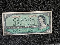 Obverse of note showing serial number and portrait