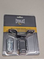 Sealed Everlast heavy bag hanger in retail blister pack with hardware visible