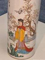 Overall view of cylindrical brush pot showing painted scene
