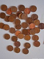 Full spread of mixed Canadian 1-cent coins showing obverse and reverse