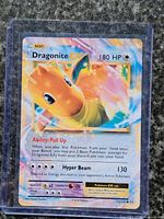 Front view of Dragonite EX card in rigid sleeve