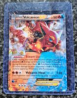 Front view of Volcanion-EX card in sleeve