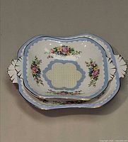 Both stacked trays showing pattern and size difference