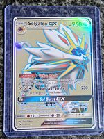 Front of Solgaleo-GX card in protective top loader