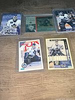 Overview of all five Felix Potvin cards in sleeves