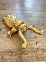 Top view of brass beetle boot jack