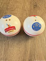 Top view showing Kingfisher and Rajasthan Royals logos and dispensing holes