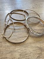 All five bangles laid flat on tabletop