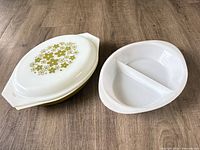 Top view showing Pyrex lid floral motif and both divided dish interiors