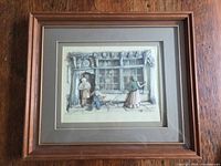 Full view of framed print showing image, mats and wood frame