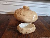 Lidded casserole dish beside matching small bowl