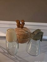 Cookie jar and two dispensers front view