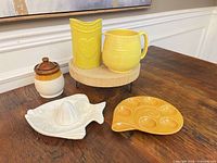 All six items grouped on table and wood stand
