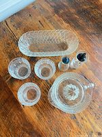 All eight pieces arranged on table