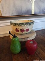 Bowl, pear grinder and apple shaker front view